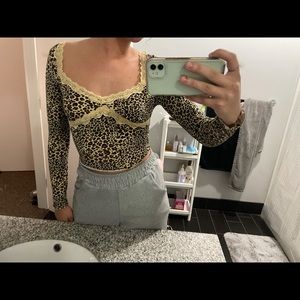 SHEIN lace trim leopard top with scalloped ends on sleeves and bottom of shirt!